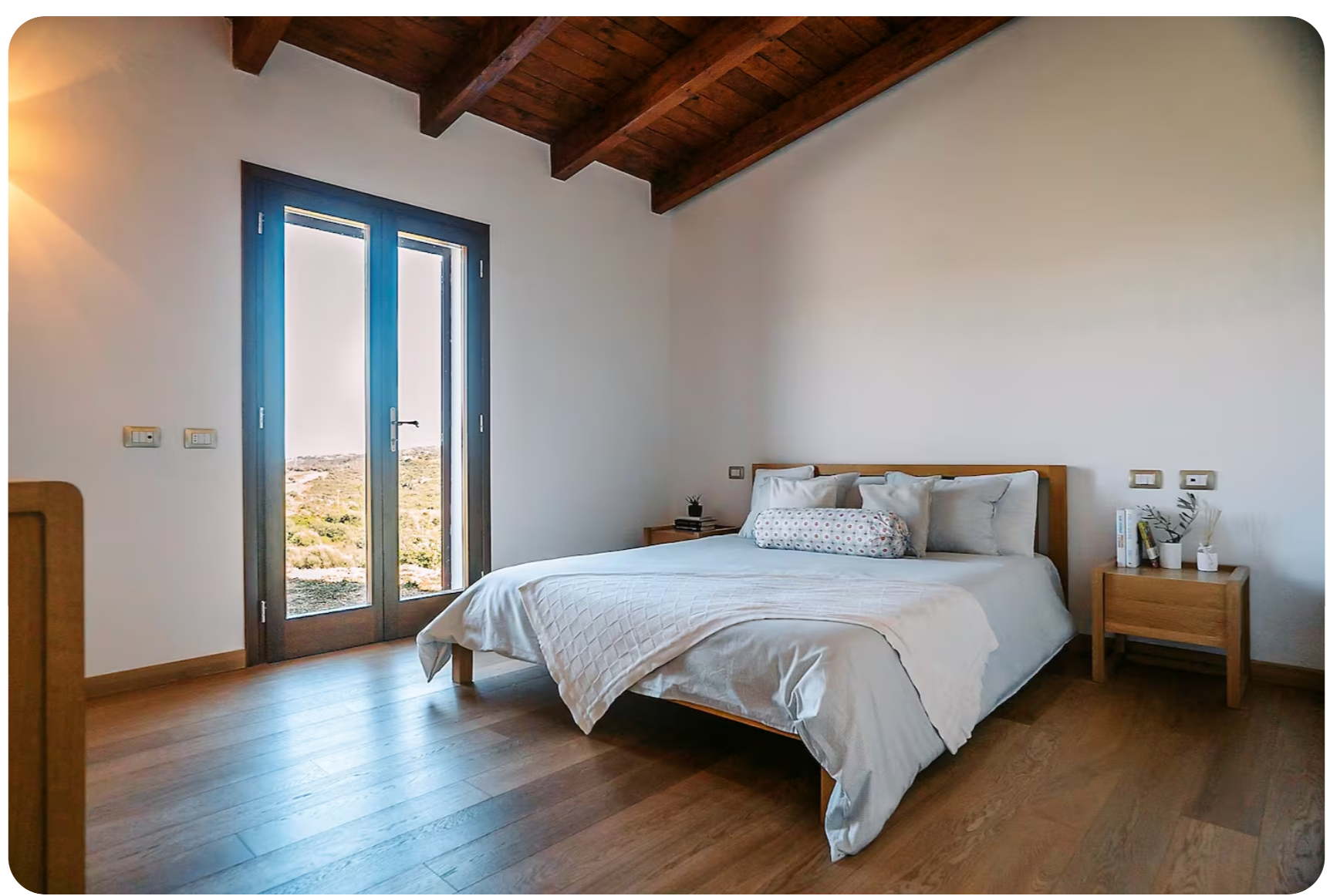 Bedroom with exposed timber ceiling